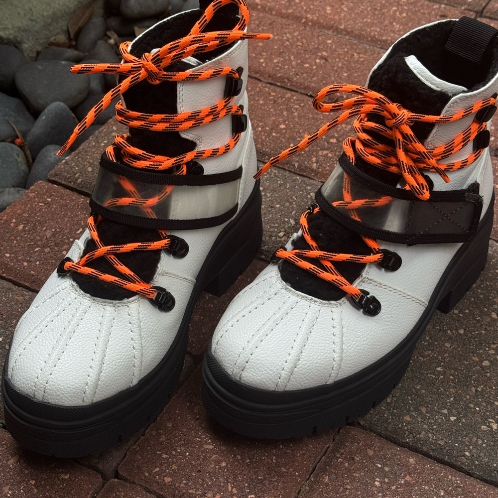 Stylish White and Black Boots with Orange Laces